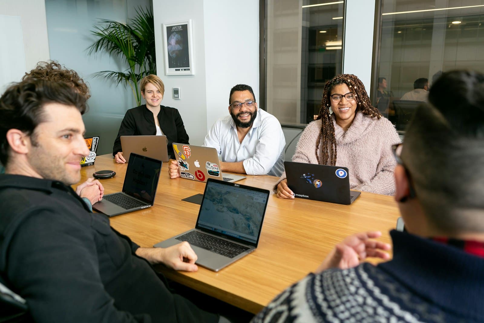 A cross-functional team reviewing a project together